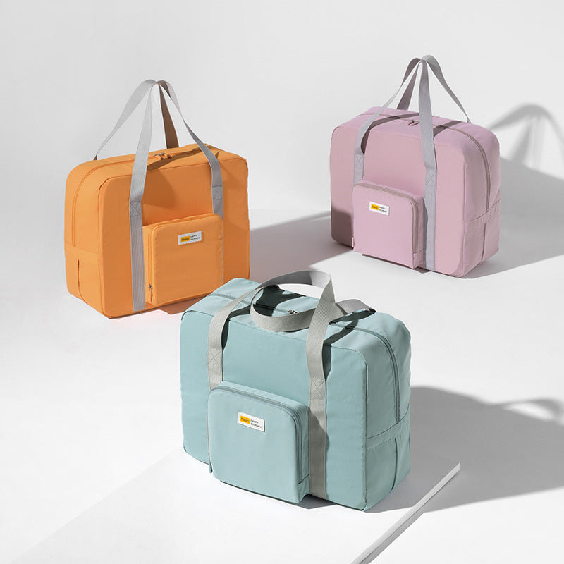 Sac de rangement pour vêtements de voyage pliable