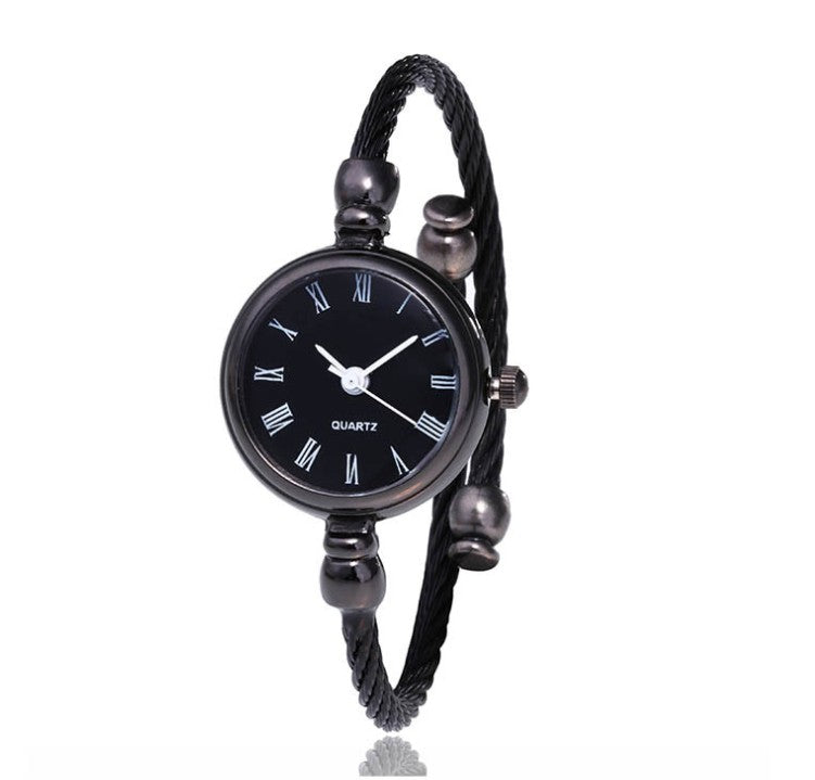 Montre à quartz élégante pour femmes avec design de bracelet ouvert