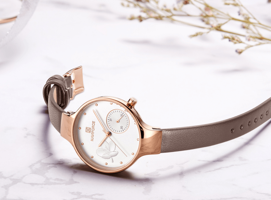 Montre analogique à quartz élégante pour femmes avec bracelet en cuir