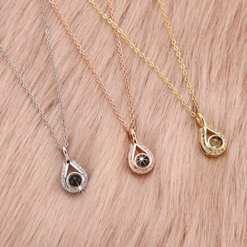 Waterdrop shaped fashion projection necklace with 100 languages. I love you. Color photos, customized lover accessories - Korvel