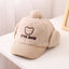 Gorra de béisbol de corduroy cálido para niños con protección para las orejas