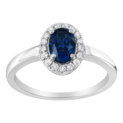 Anillo de cóctel de zafiro azul en halo de oro blanco de 10K - Talla 7