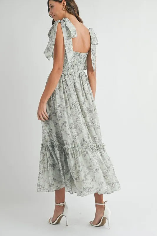 Robe midi froncée à buste floral avec lien d'épaule