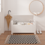 A white rubber wood children's toy box with soft cushioned seats, stools, flip covers, and safety hinges for toy storage - Korvel