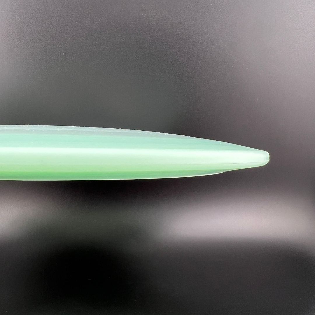Disque de Golf Disc Primo Color Glow Thread