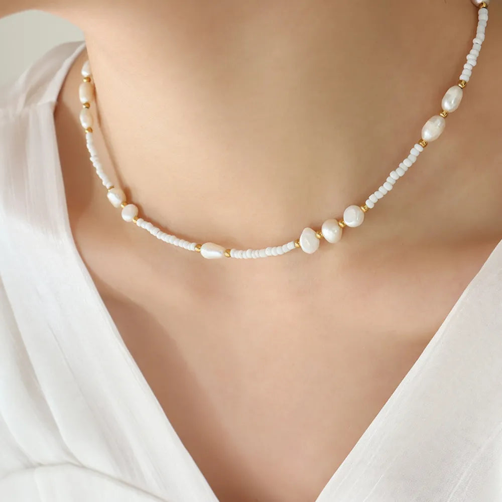 Collier en perles de verre en acier titane