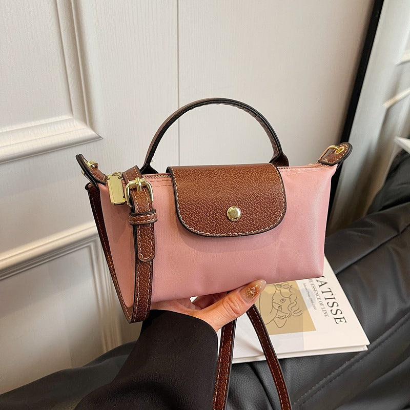 2025 Women's Mini Dumpling Handbag. Made of high - end nylon. Stylish shoulder/crossbody phone bag. - Korvel