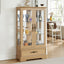 Light colored glass cabinet with adjustable glass frame, including cabinet light bulbs OAK with 2 doors and 1 drawer - Korvel