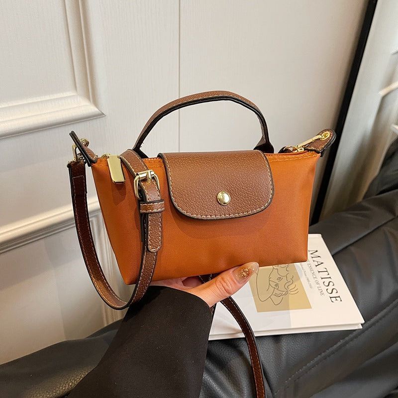 2025 Women's Mini Dumpling Handbag. Made of high - end nylon. Stylish shoulder/crossbody phone bag. - Korvel
