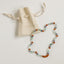 Collier en perles d'ambre de la mer Baltique et de pierres précieuses naturelles