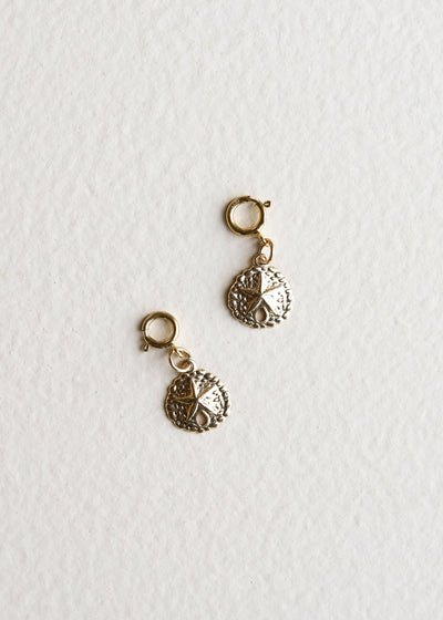 Charm en sable en or 14 carats