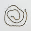 Collier de lunettes en ambre de la mer Baltique - Noir naturel