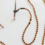 Collier de lunettes en ambre de la mer Baltique - Cognac naturel