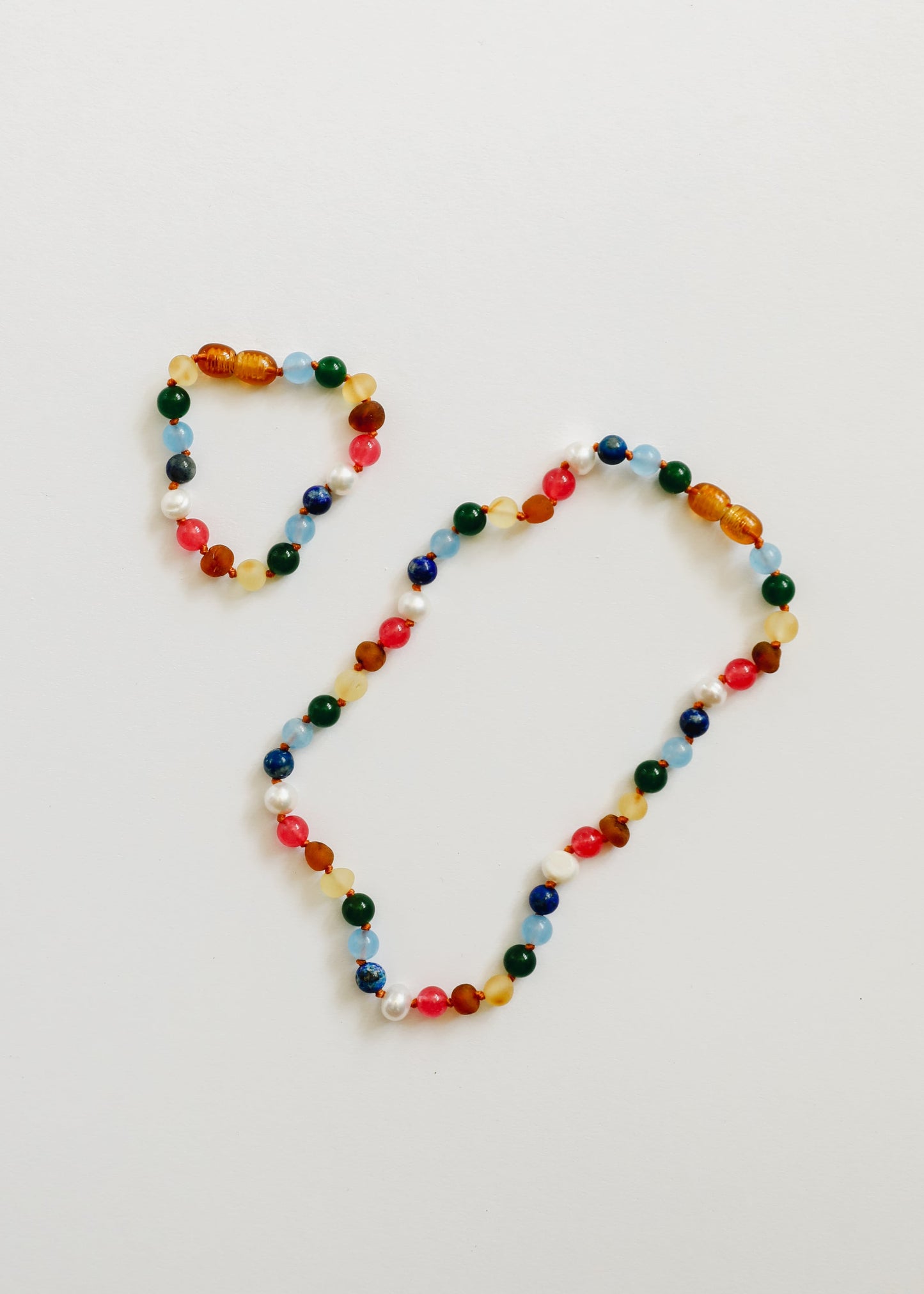 Raw Baltic Amber and Pearl Bracelet with Pink Gemstones