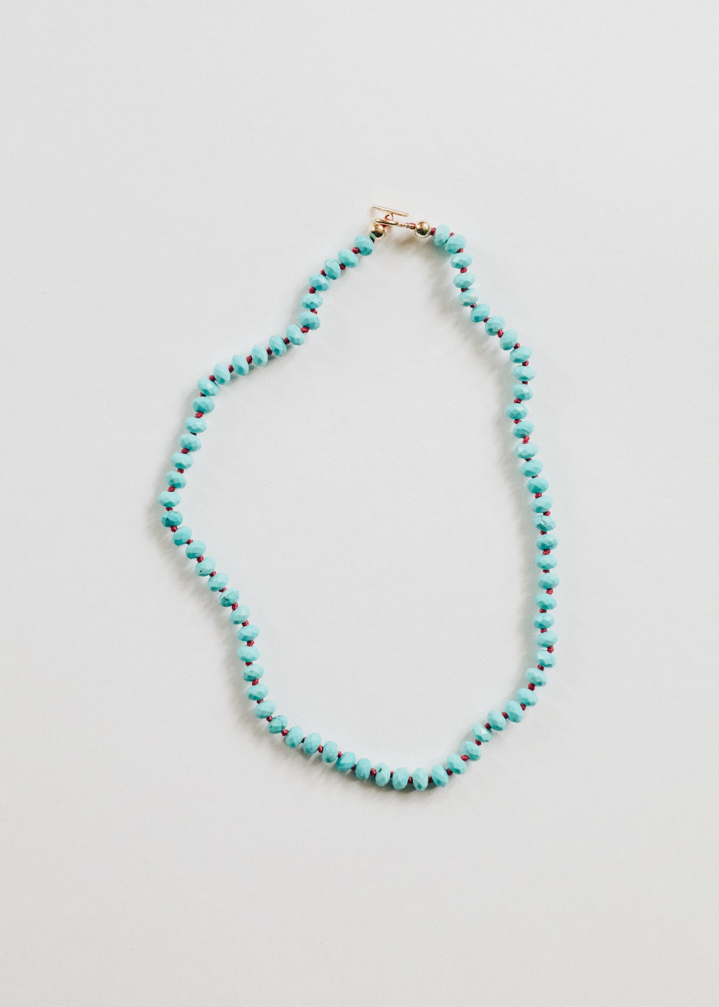 Collier en turquoise et or 14 carats avec fermoir à bascule