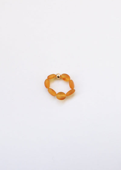 Bague extensible en ambre baltique miel brut et or 14 carats