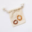 Bague extensible en ambre baltique cognac brut et or 14 carats