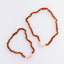 Ensemble de collier en ambre baltique cognac brut et quartz rose