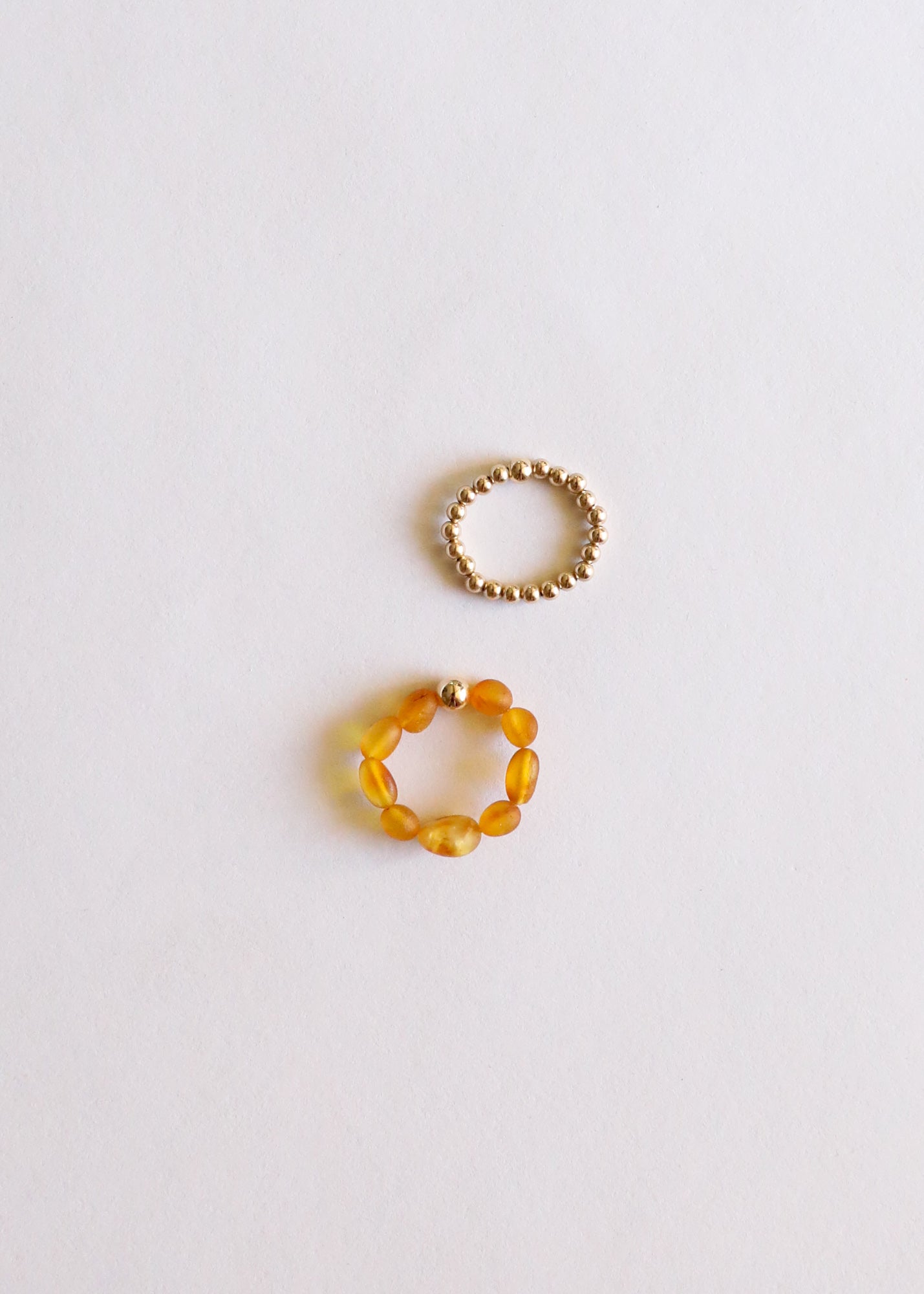Conjunto de Anillos de Ámbar Báltico y Oro de 14K