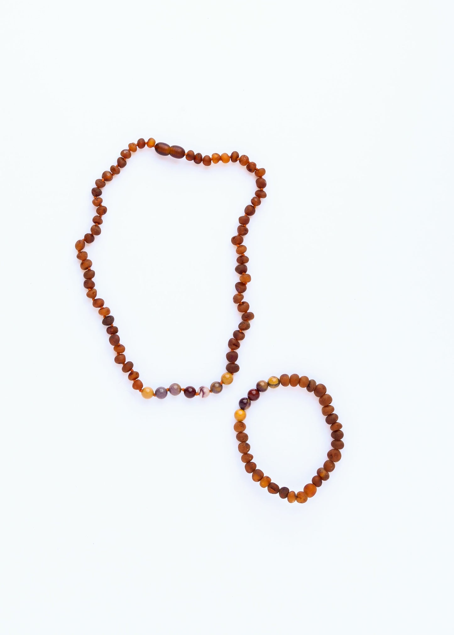 Bracelet élastique en ambre baltique cognac brut et jaspe mookaite