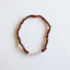 Ensemble de collier en ambre baltique cognac brut et quartz rose