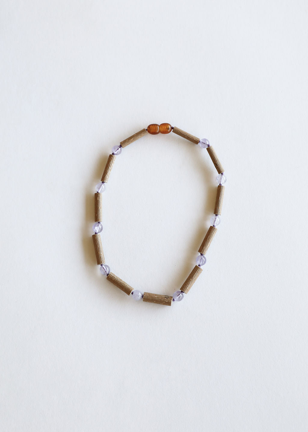 Collier en bois de noyer et améthyste