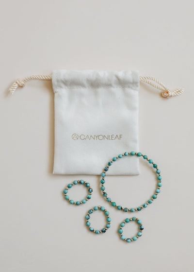 Bague Élastique Soleil en Turquoise Naturelle et Or 14 Carats