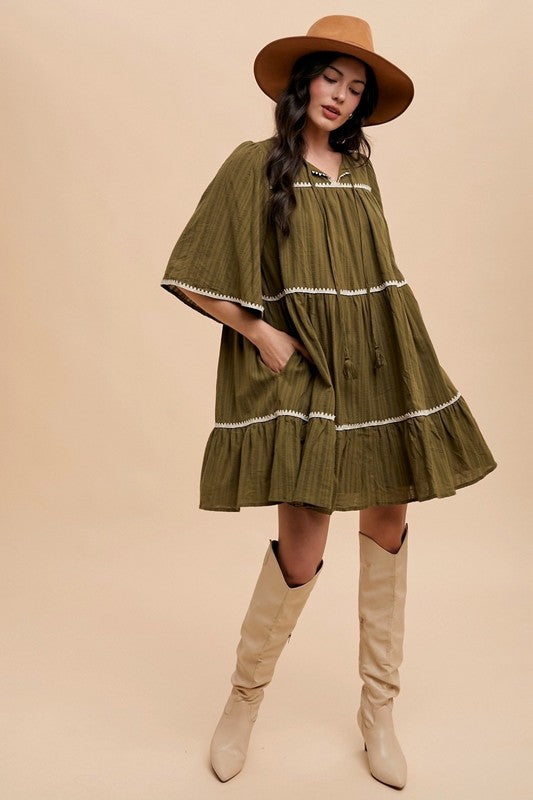 Chic Bohemian Tiered Dress with Tassel Details and Contrast Trim - Korvel