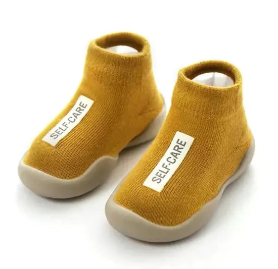 Chaussures pour bébés à semelle souple antidérapante pour les premiers pas
