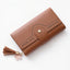 Geometric Letter Buckle Clutch Bag with Tassel Design