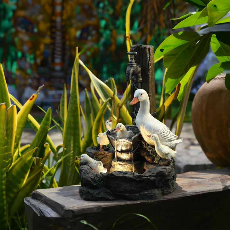 Solar resin duck garden fountain with LED squirrel design, outdoor decor (E2). - Korvel