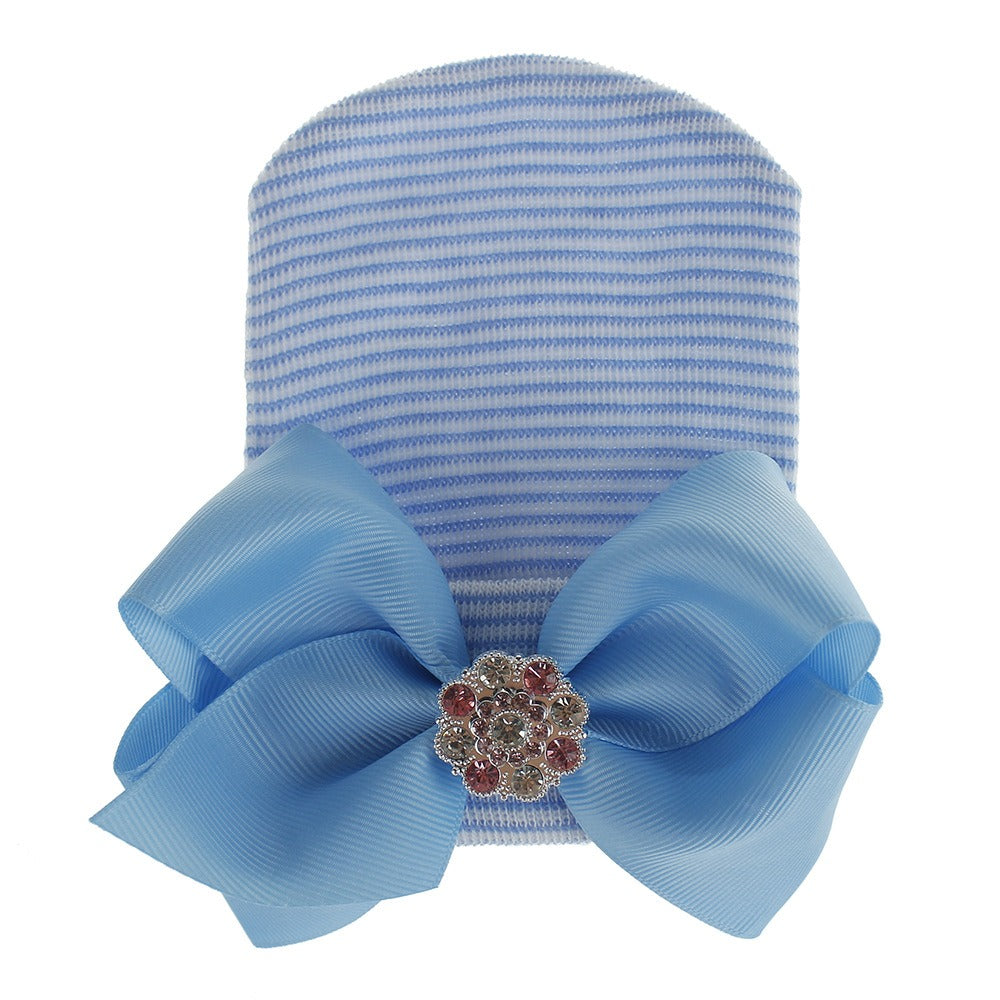 Chapeau en tricot rayé rose scintillant pour bébé avec un grand nœud