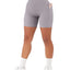 Shorts de sport croisés pour femmes avec ceinture et poches