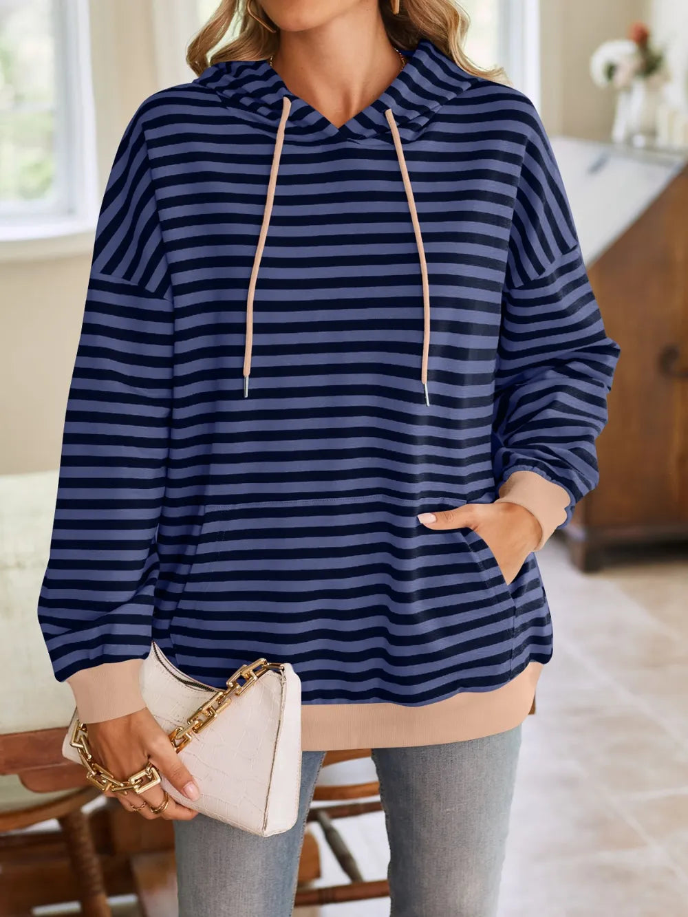 Sudadera con capucha a rayas suelta y casual