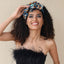 Bandeau à motif floral et feuillage surdimensionné