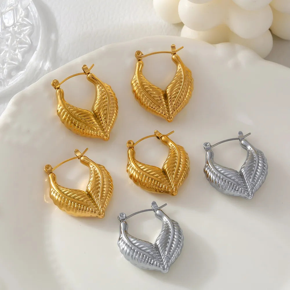 Leaf patchwork heart-shaped earrings with a niche design and titanium steel earrings - Korvel