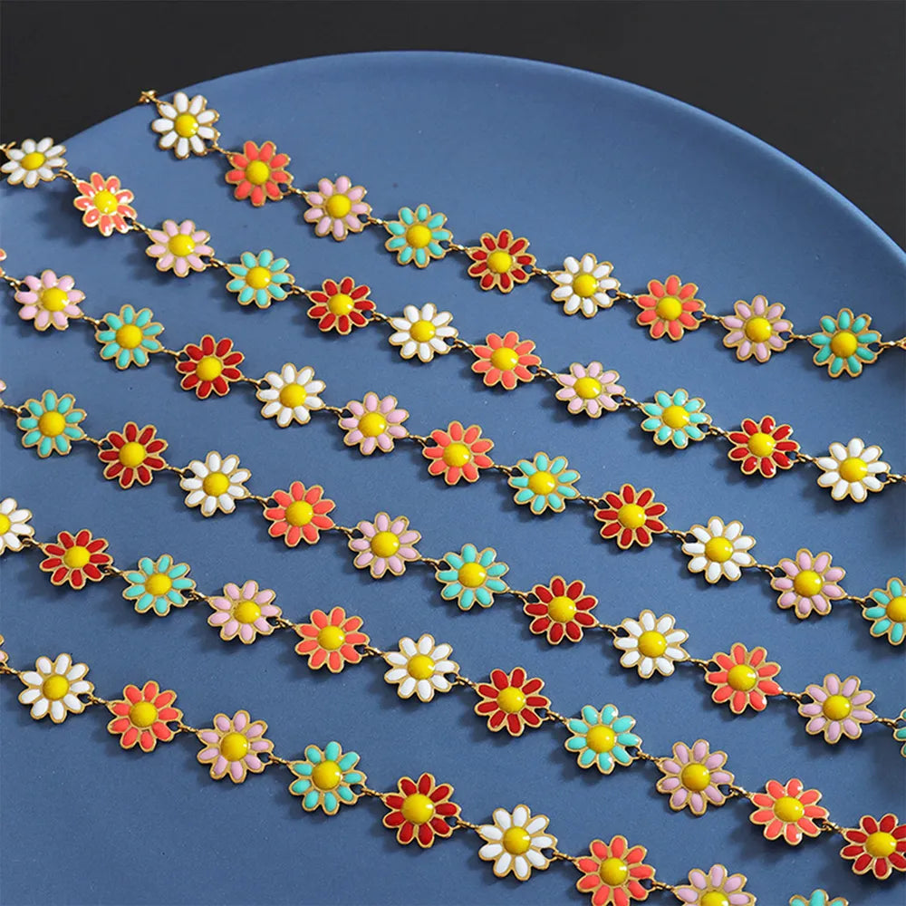 Collier en fleur avec goutte d'huile en acier titane