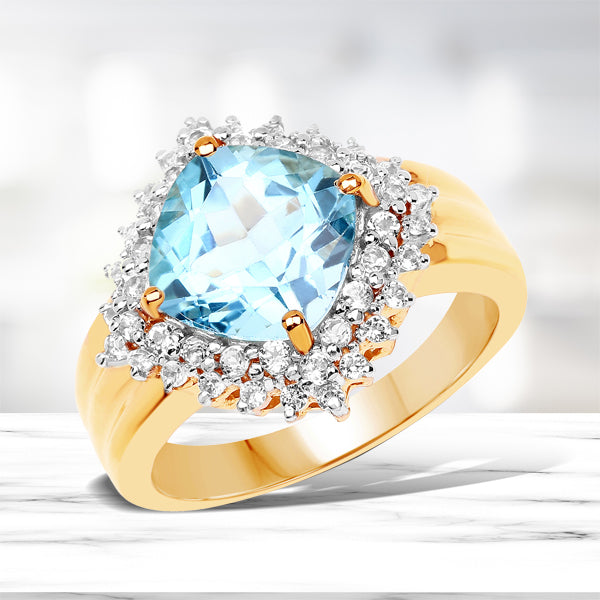 Anillo de Topacio Suizo Azul y Topacio Blanco Bañado en Oro Amarillo de 14K