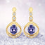 Boucles d'oreilles en or jaune 14K avec tanzanite et diamant de 0,76 carat