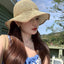 Chapeau en paille à large bord et résistant au soleil pour les sorties à la plage