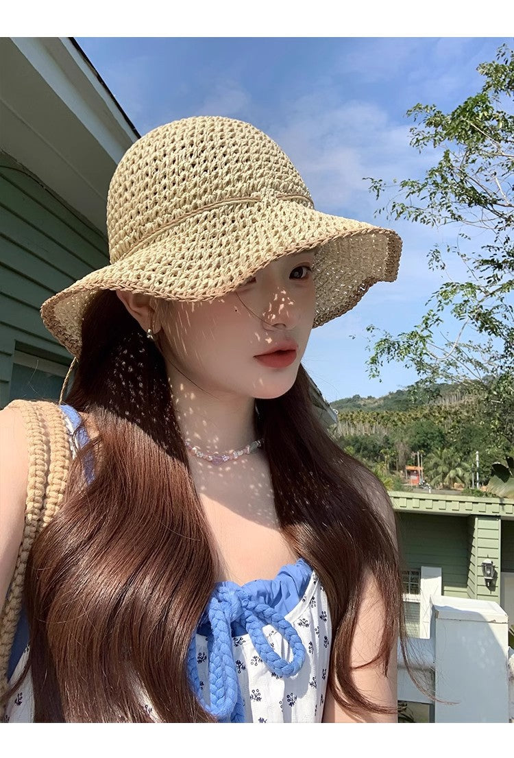 Chapeau en paille à large bord et résistant au soleil pour les sorties à la plage