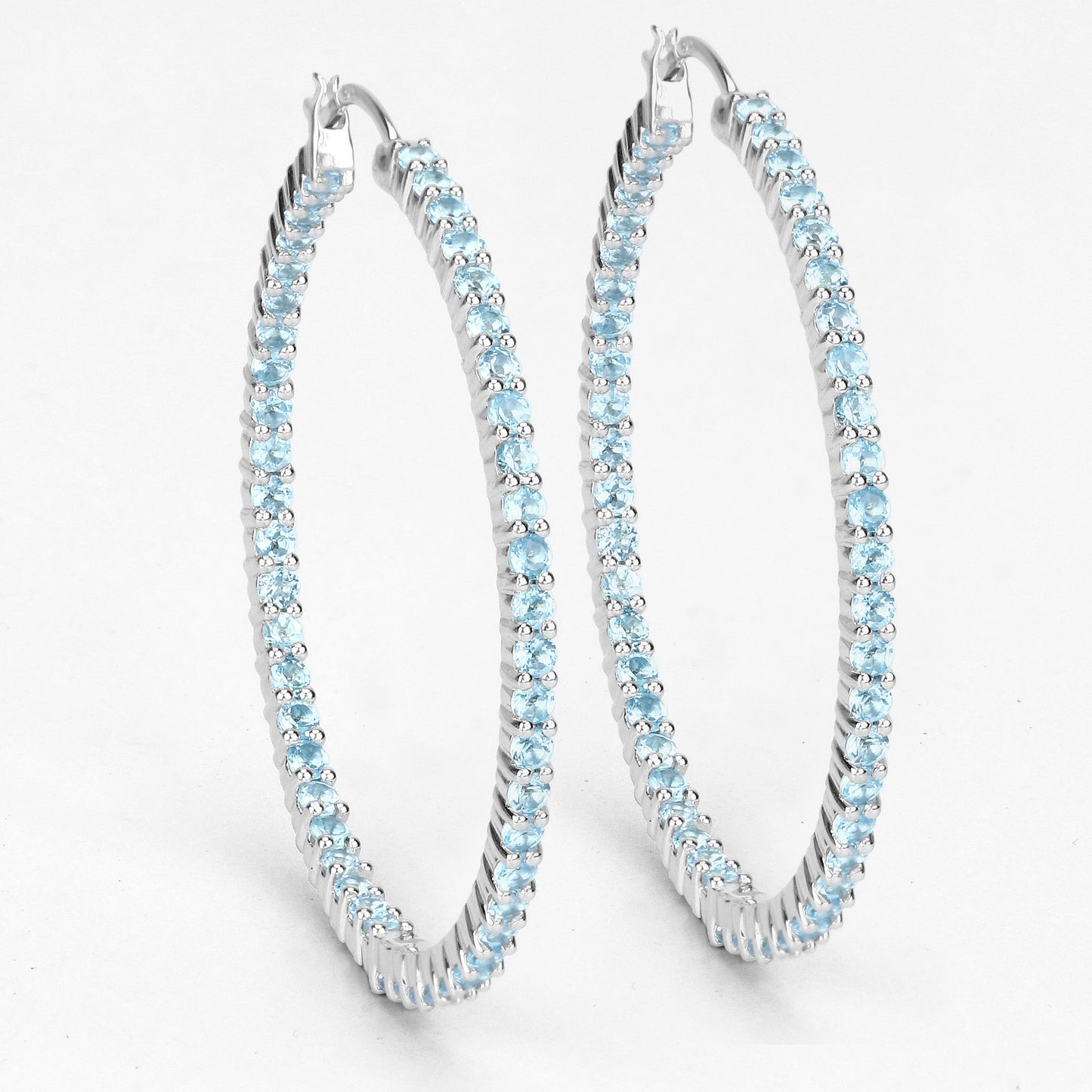 Pendientes de plata esterlina con topacio azul suizo genuino de 3.60 quilates