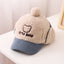 Gorra de béisbol de corduroy cálido para niños con protección para las orejas