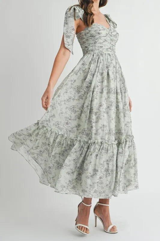 Robe midi froncée à buste floral avec lien d'épaule