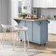 Kitchen handcart with rubber wood leaf countertop, storage cabinet, shelf, and 3 dining room drawers, gray blue - Korvel