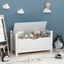 A white rubber wood children's toy box with soft cushioned seats, stools, flip covers, and safety hinges for toy storage - Korvel