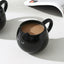 Adorable hand - painted cat - shaped ceramic mug, perfect for coffee or tea. - Korvel