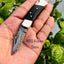 Artisan Crafted Damascus Steel Mini Folding Pocket Knife with Buffalo Horn Grip & Leather Sheath - Korvel