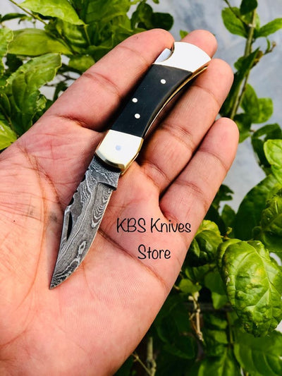 Artisan Crafted Damascus Steel Mini Folding Pocket Knife with Buffalo Horn Grip & Leather Sheath - Korvel