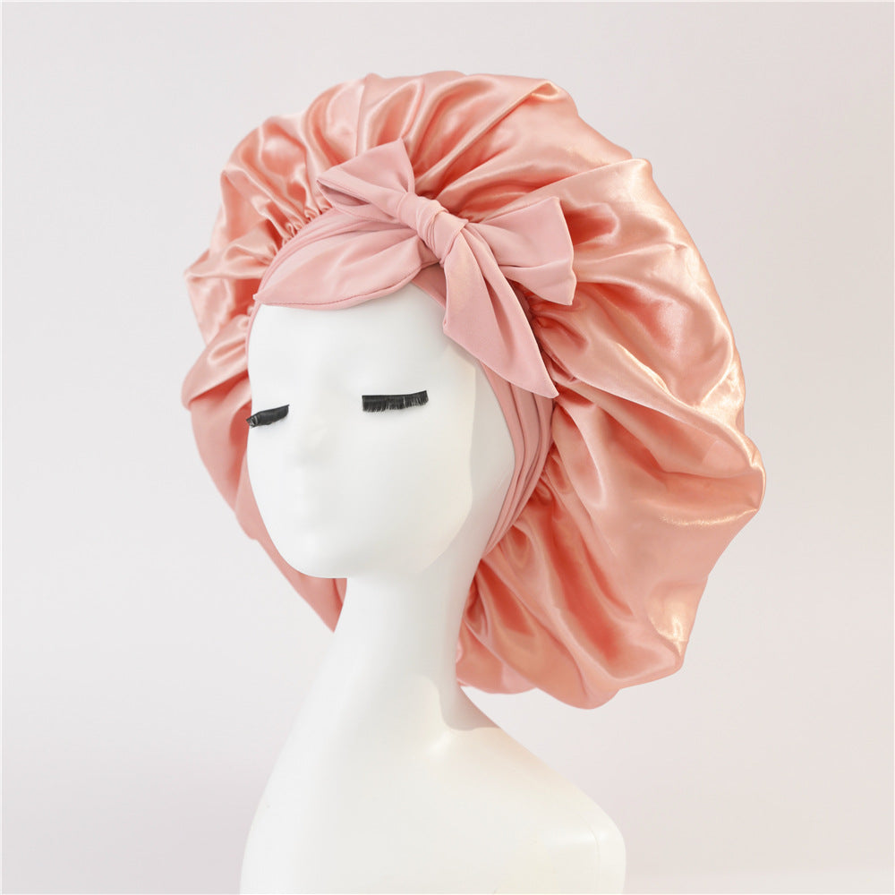 Turban élégant à large bord avec détail en nœud